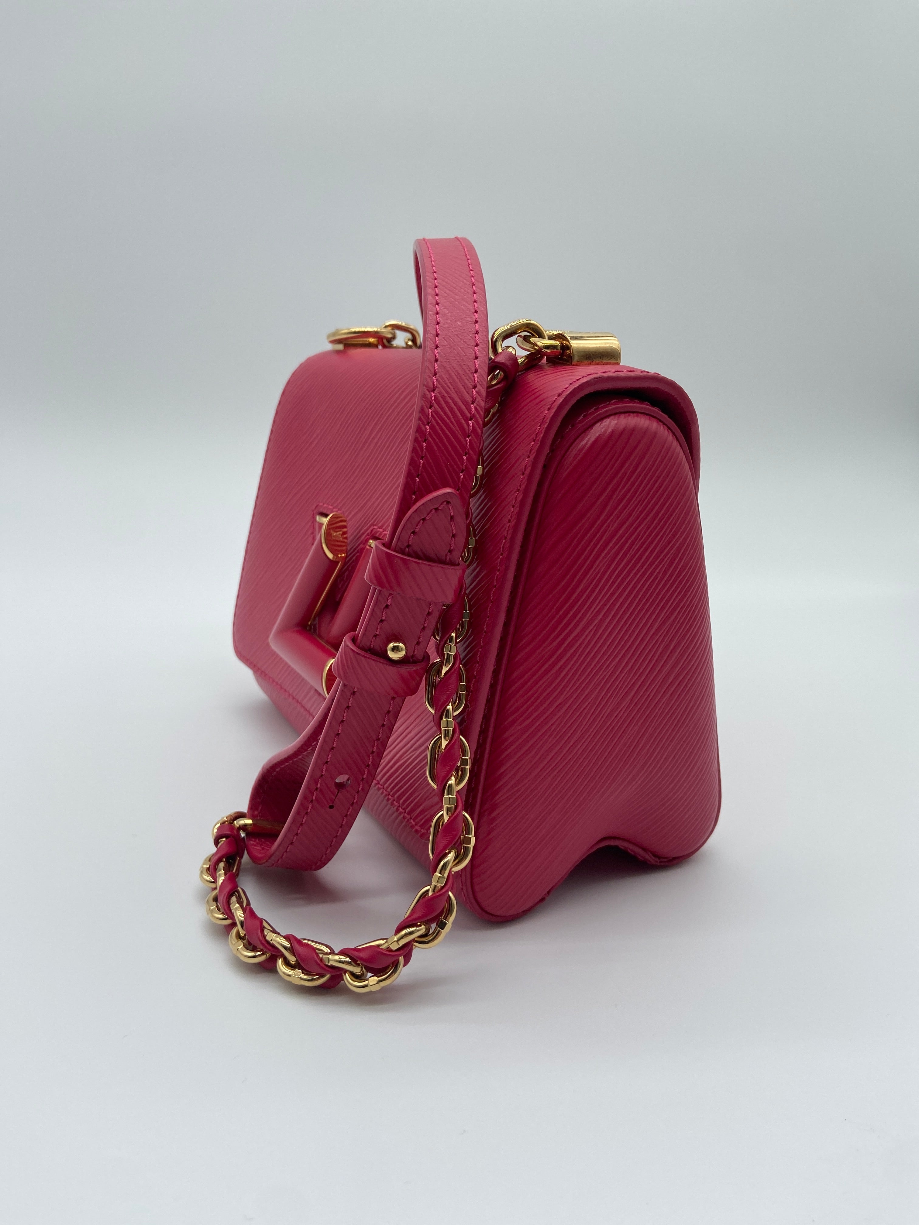 Louis Vuitton Epi Twist PM shoulder bag in pink