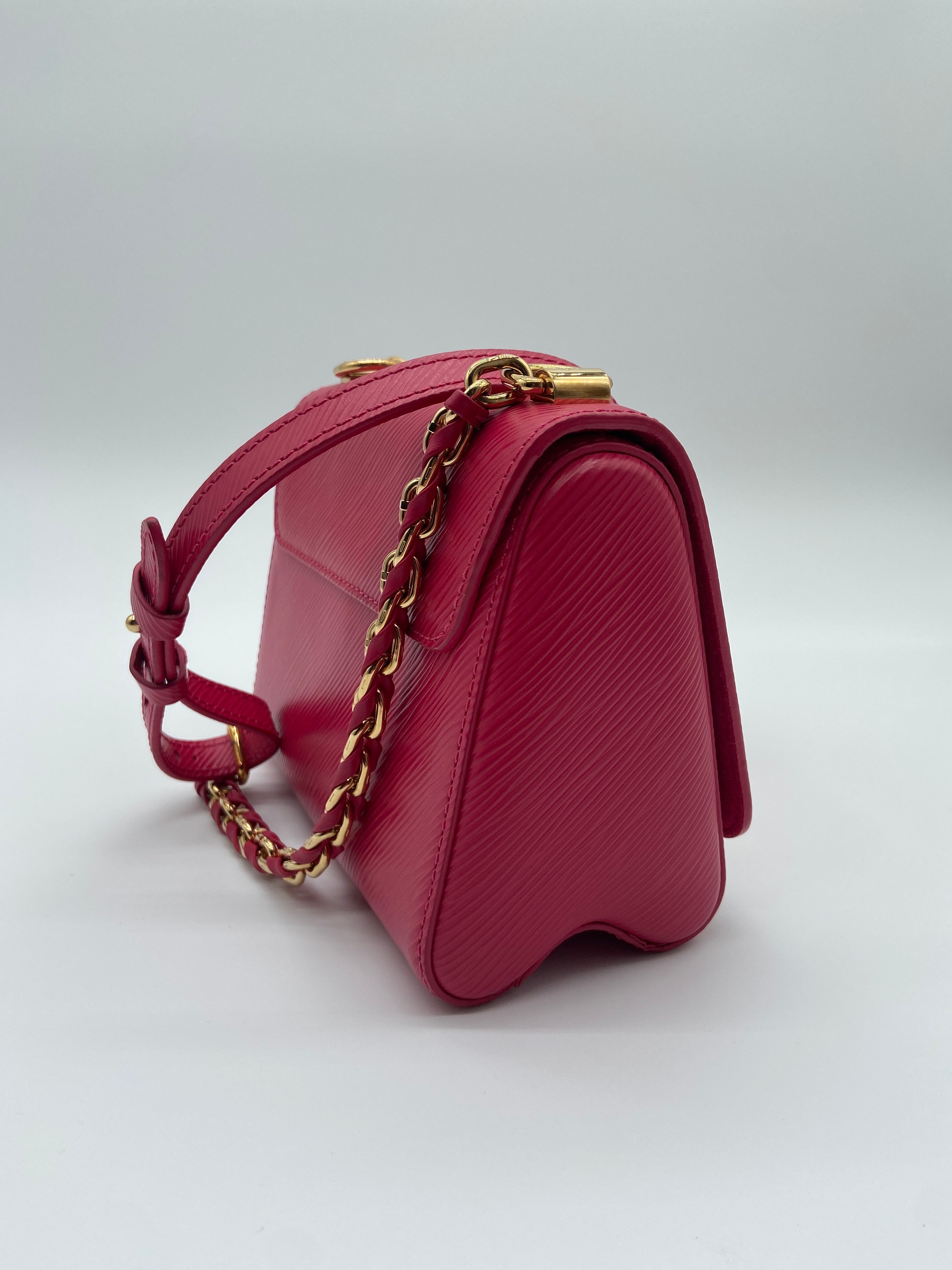 Louis Vuitton Epi Twist PM shoulder bag in pink