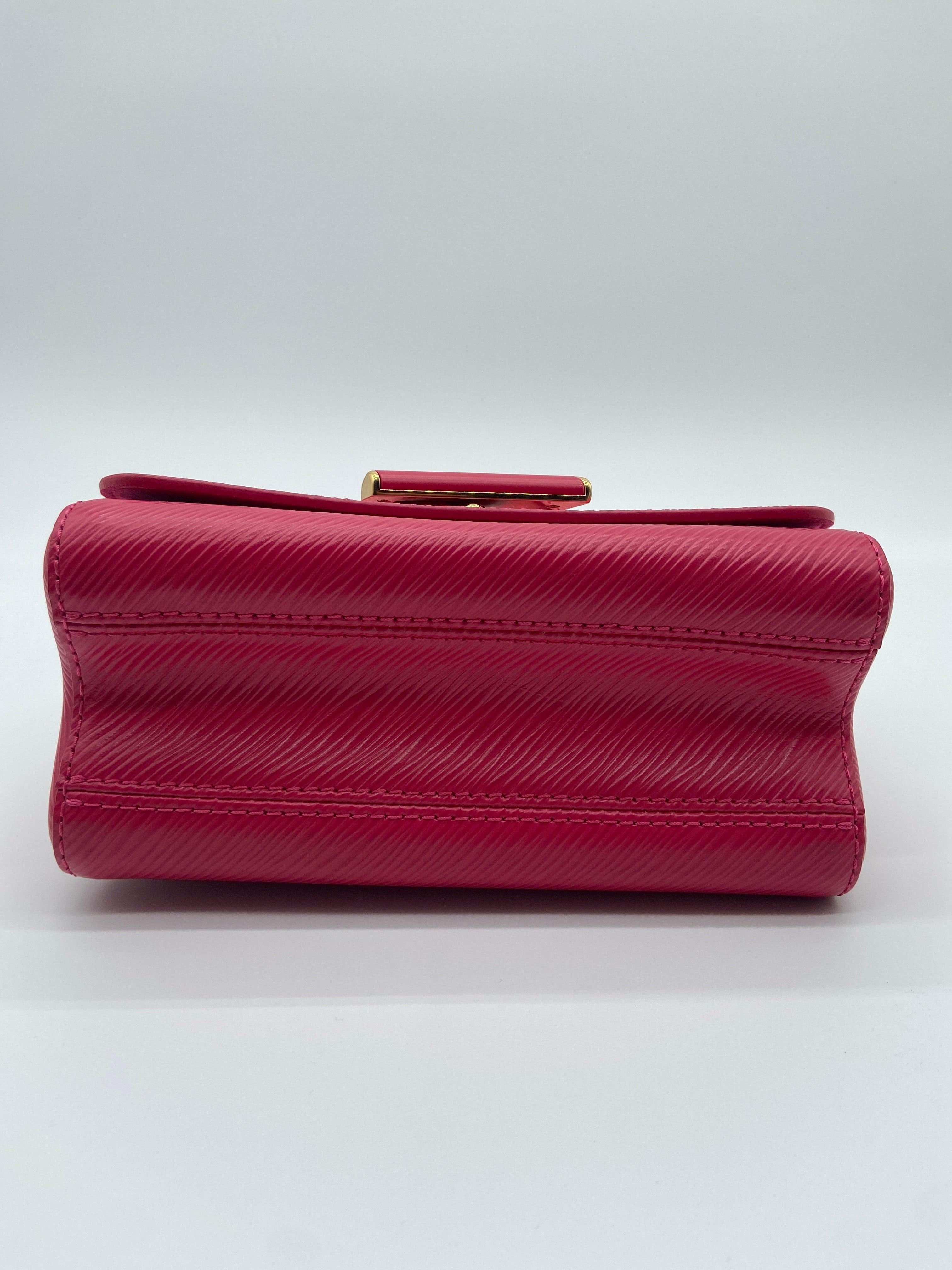 Louis Vuitton Epi Twist PM shoulder bag in pink