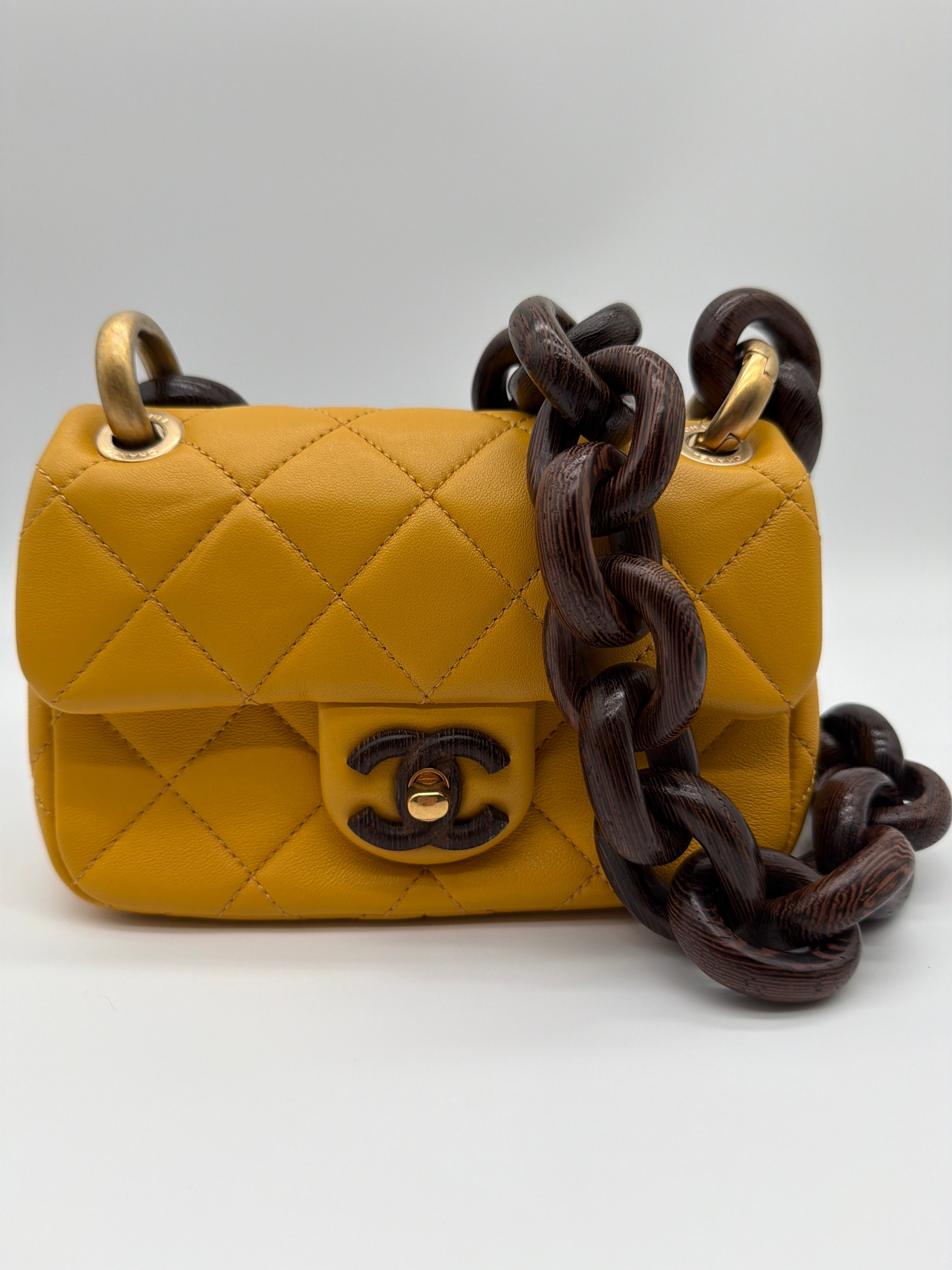 Chanel Lambskin Wenge Wood Mini Flap Bag in bright yellow image 1