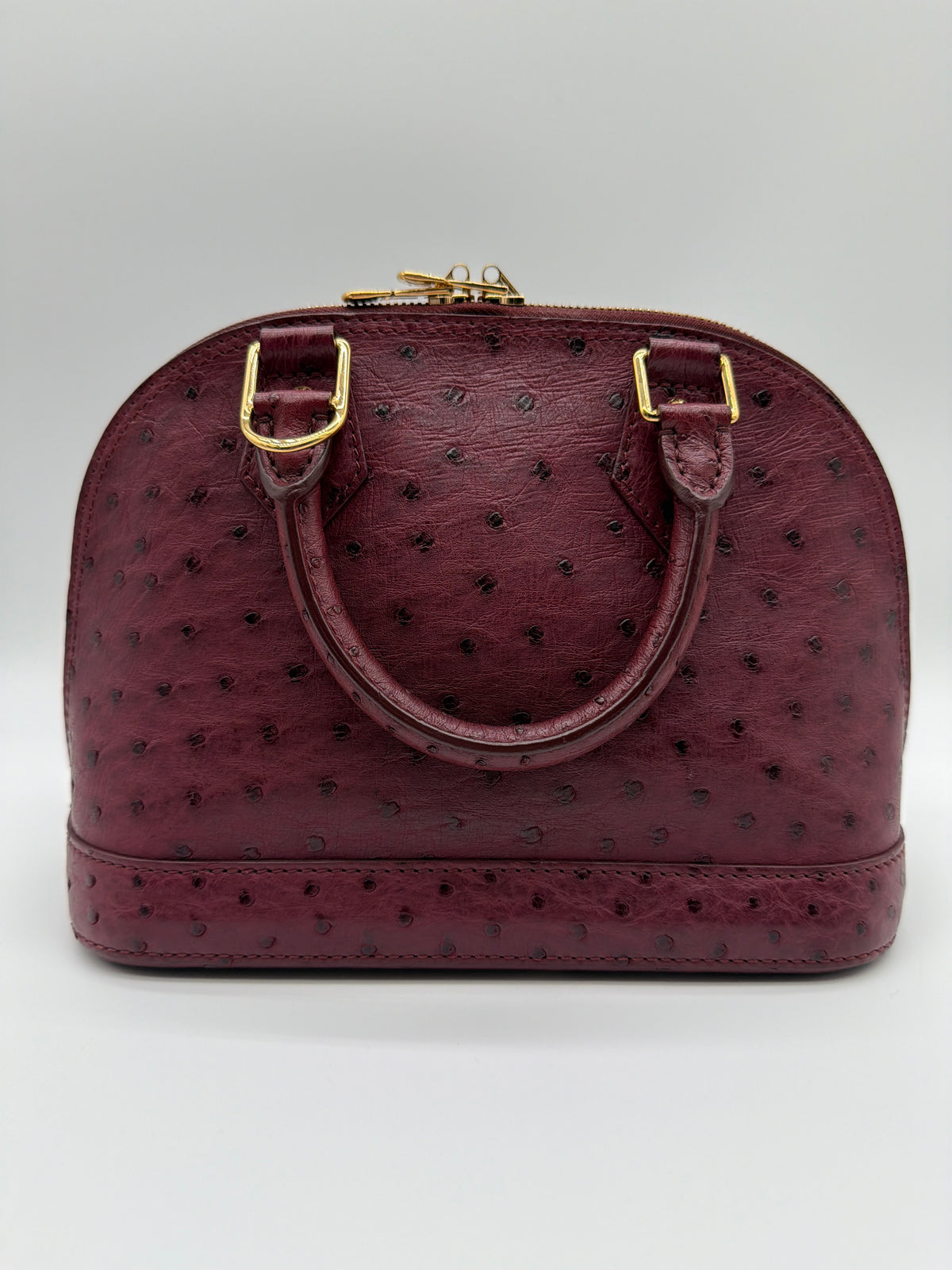 Louis Vuitton Ostrich Alma in burgundy image 1