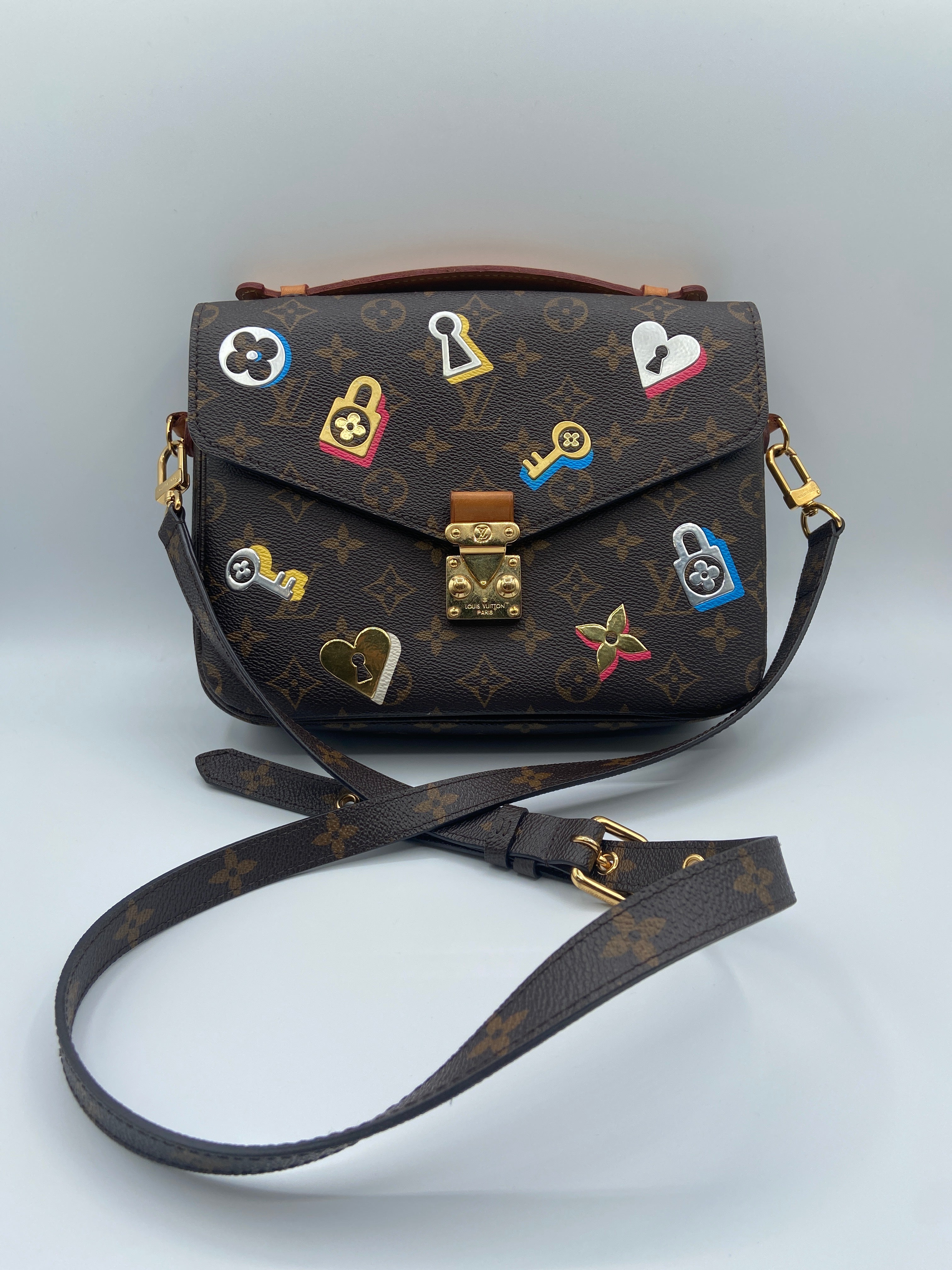 Louis Vuitton Monogram Love Lock Pochette Métis – Limited Edition