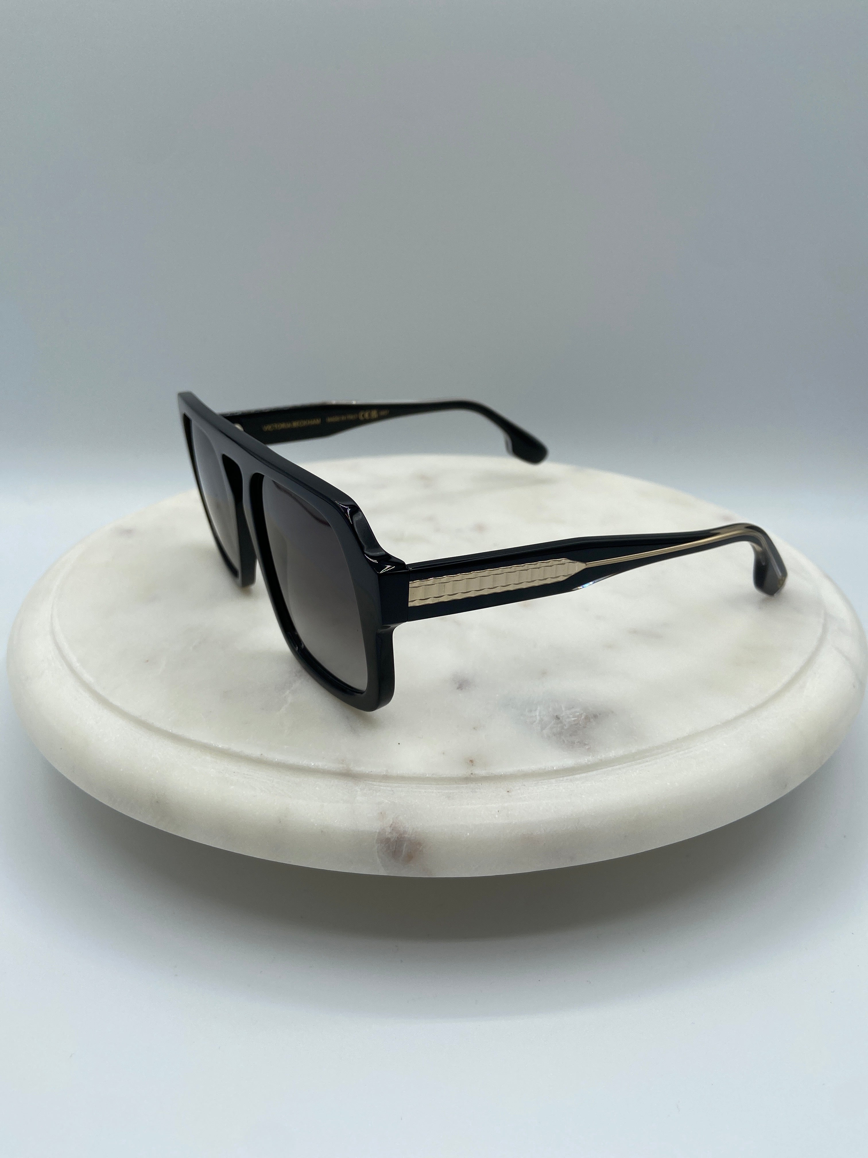 Victoria Beckham Sunglasses – Black Rectangular Frame with Gold Temple Detail