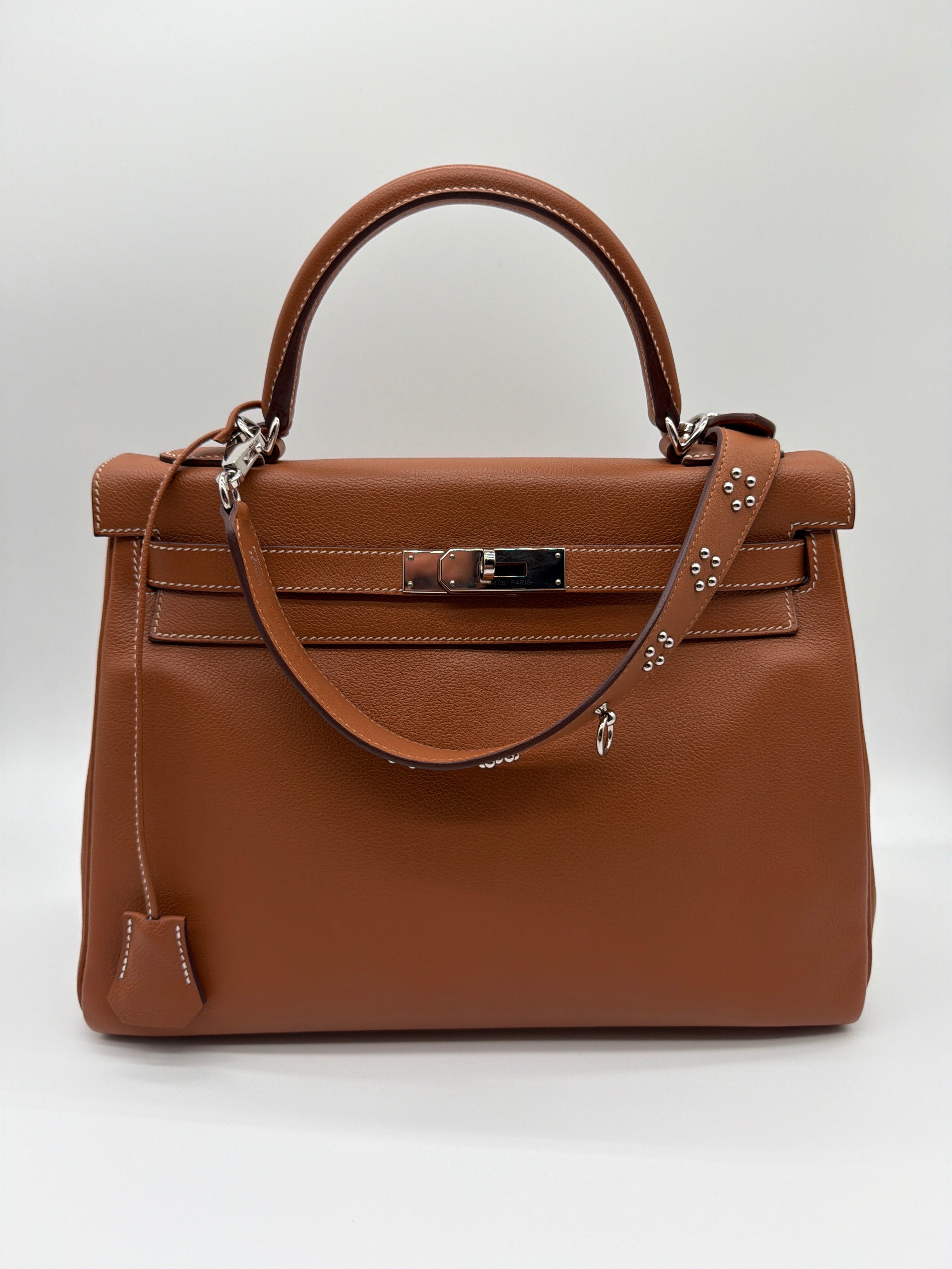 Hermès Kelly Retourne 32 in Gold Togo — image 1